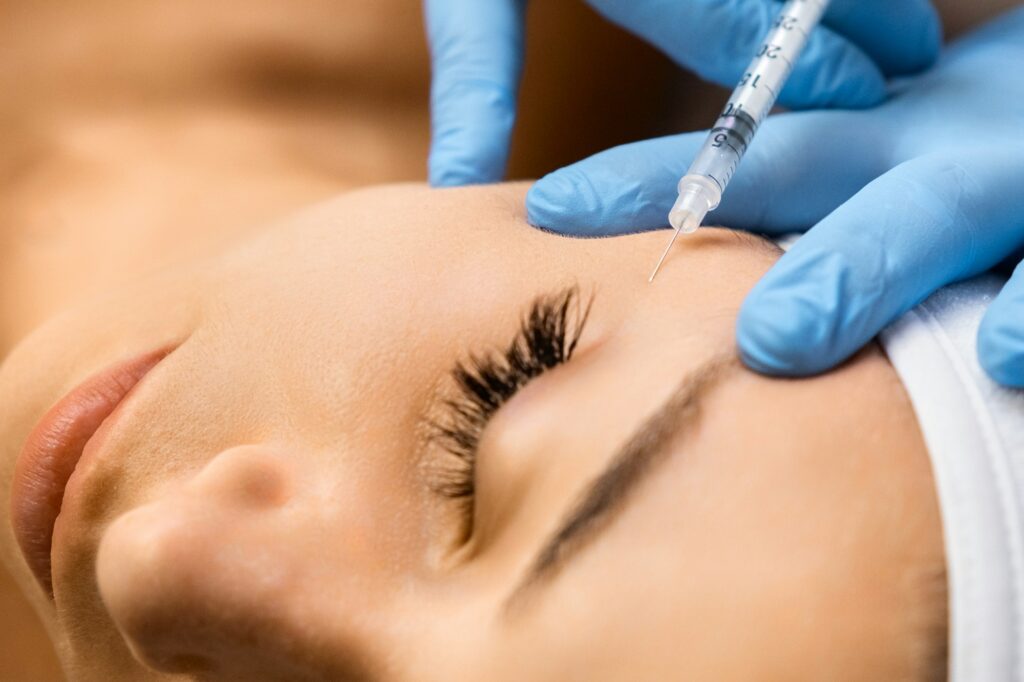 Face Injection for anti aging and biorevitalization effect in beauty salon.